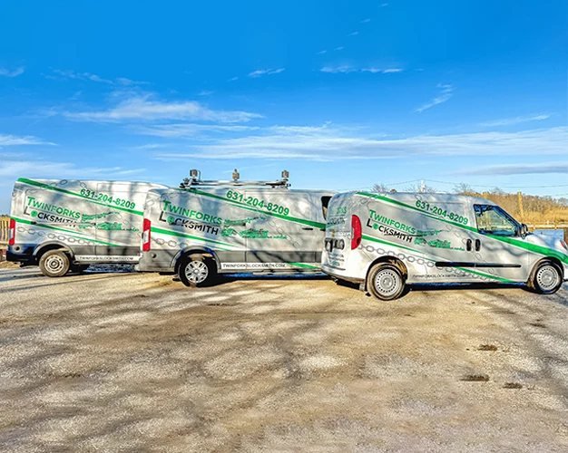 Twinforks Locksmith branded service vans parked side by side