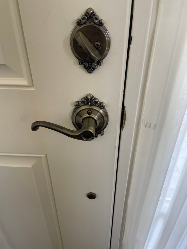 Schlage custom interior deadbolt and lever trim installed to match existing hardware on Alphabet Street in Holbrook