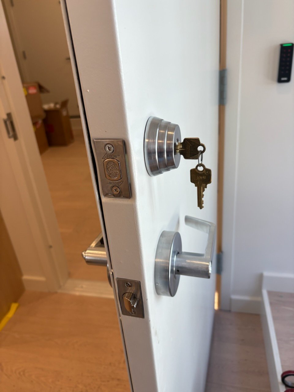 Arrow deadbolt and commercial lever at the marina office in Bay Shore